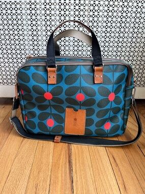 Orla Kiely Teal Floral Laptop Bag with Red Dot Accents and Brown Trim